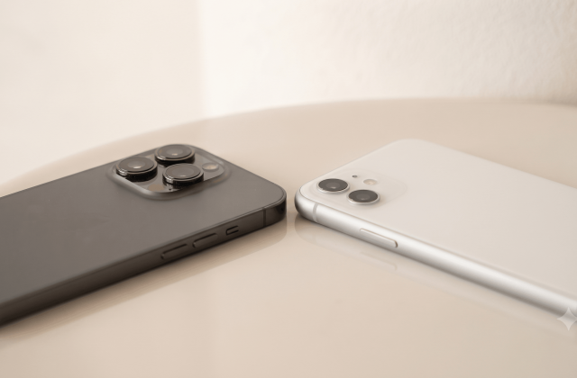 Two smartphones placed side by side for comparison